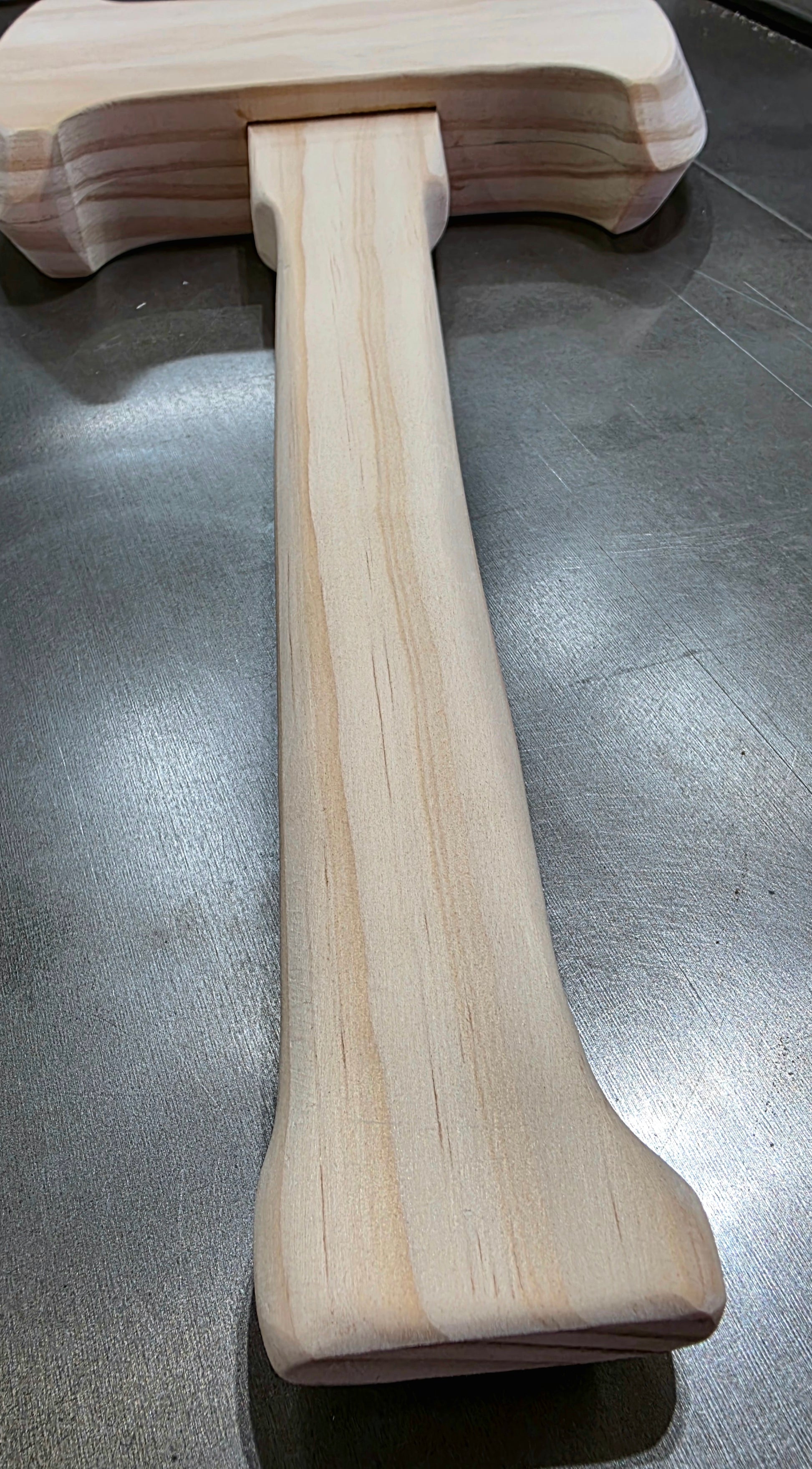 hand carved wooden axe handle